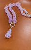 Pink sapphire beaded necklace with a gold clasp and pendant