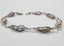 Iridescent Long Keshi Pearl and Pink Sapphire Bracelet in Silver