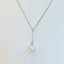 White Ripple Pearl Drop Necklace in Silver