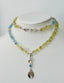 Yellow Topaz and Blue Aquamarine Necklace with Rutile Pendant in Silver and Gold