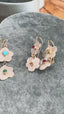 Two Flowers Dangle Earrings with Ruby and Sapphire in Gold and Silver