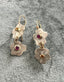 Two Flowers Dangle Earrings with Ruby and Sapphire in Gold and Silver